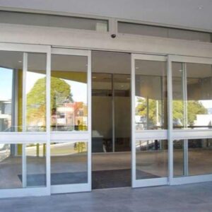 Automatisme pour porte vitrée